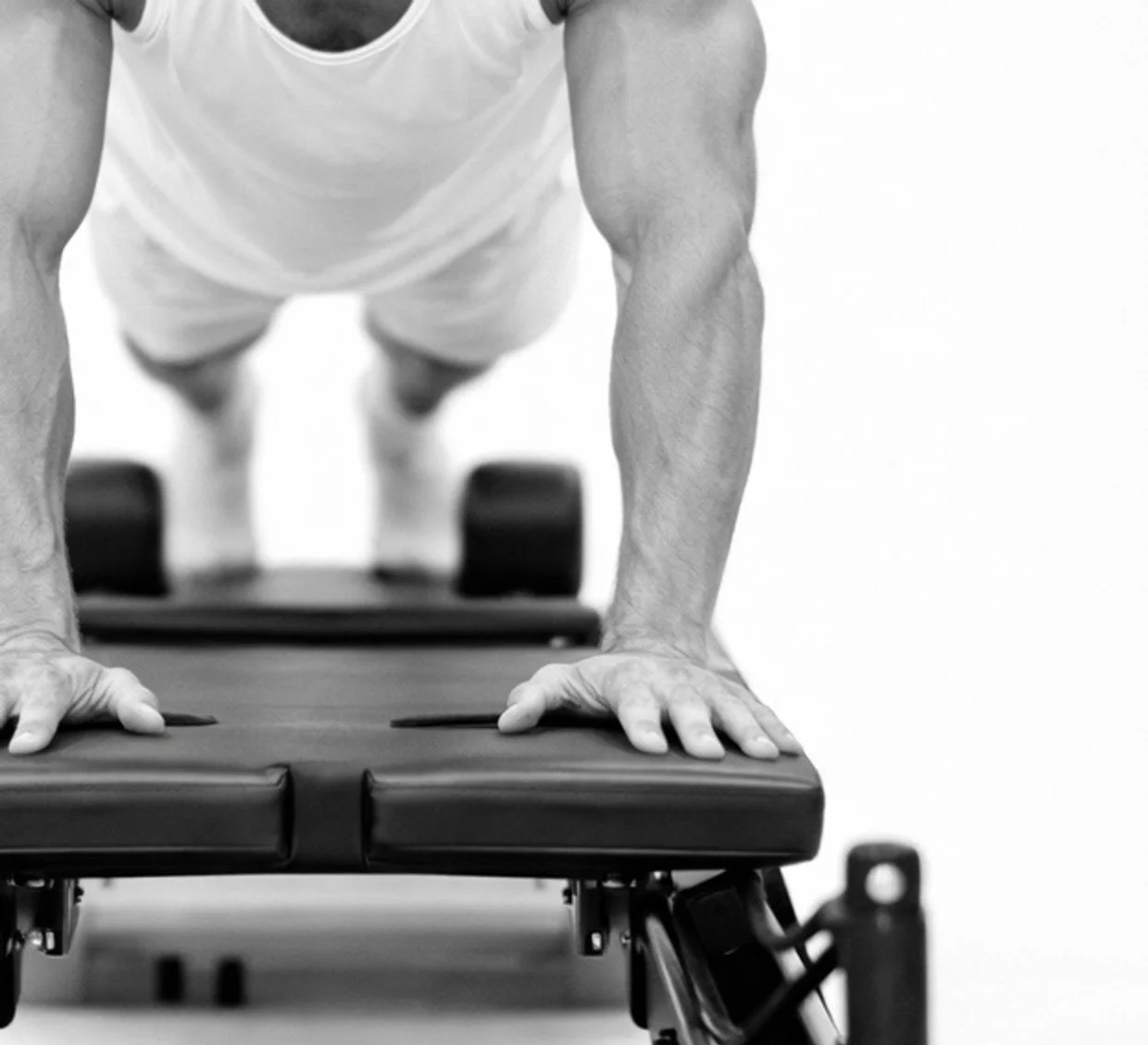 Reformer-based controlled movement representing KM Reformer Pilates